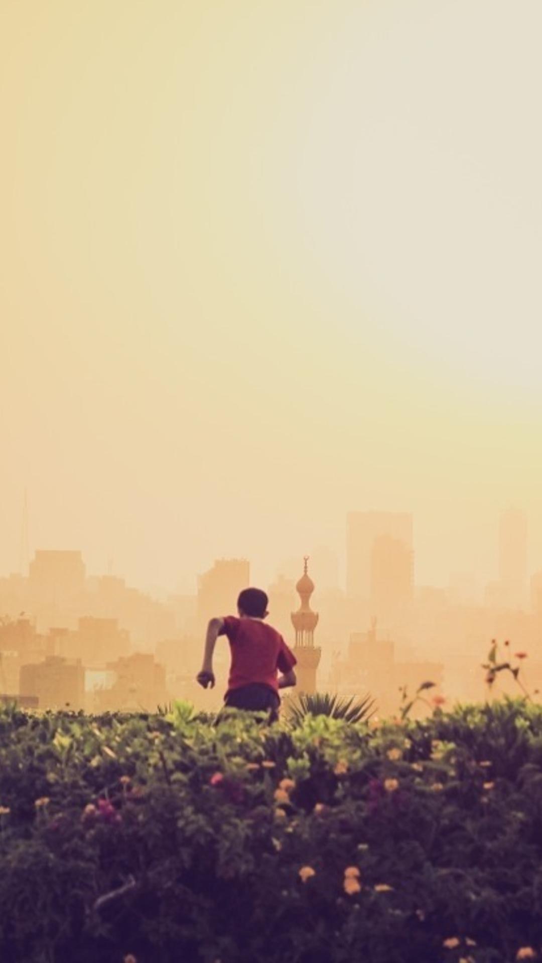 Person in a sunlit landscape